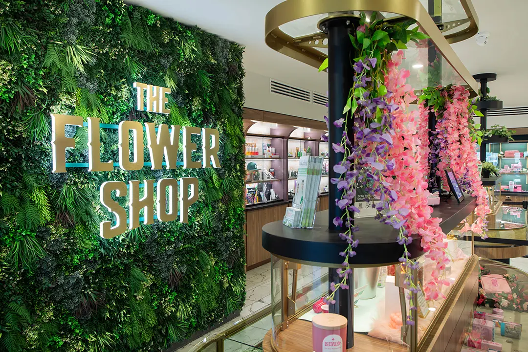 Artificial green wall and custom artificial plant design at The Flower Shop in Phoenix, AZ. Photo Credit: Addison Shinn, Wespac Construction