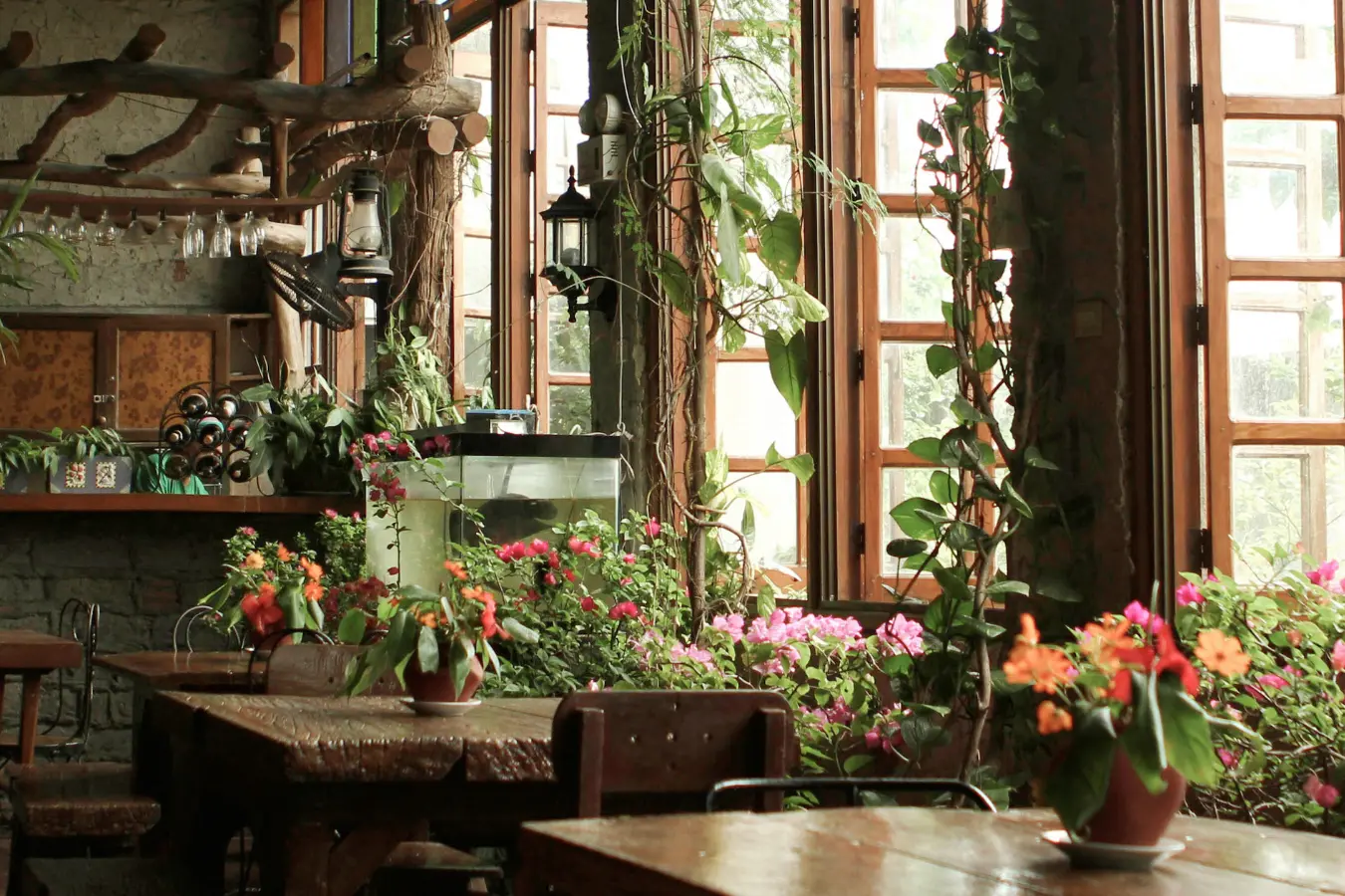 Strategically placed plants for soundproofing act as natural barriers in open offices.